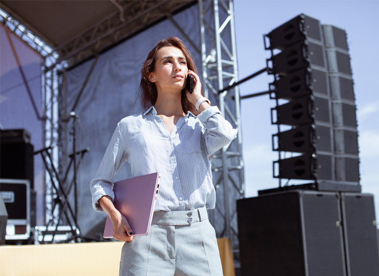 a tour manager on the phone